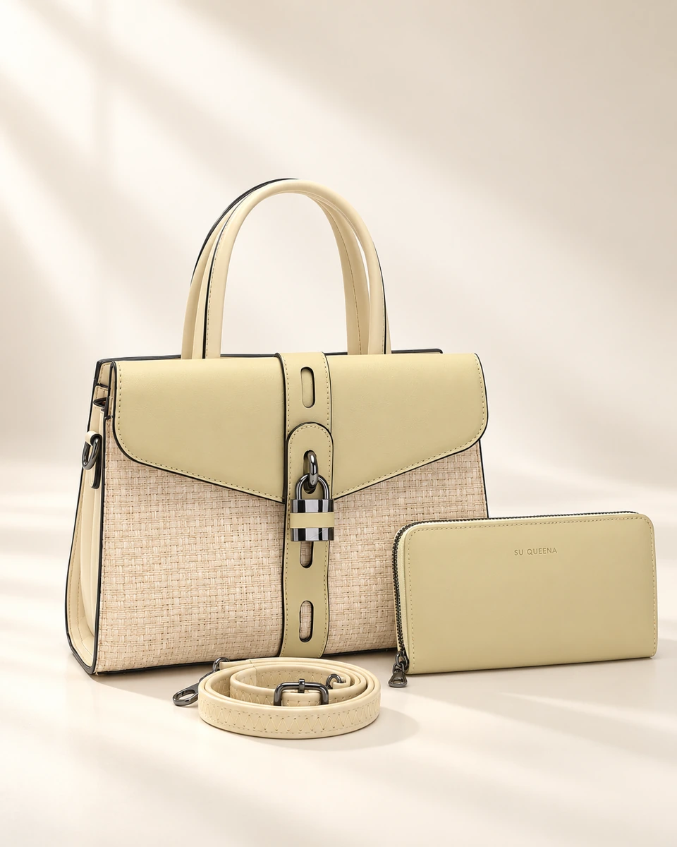 Model 2579, twin-handle tote with a central strap, shown with a wallet and coiled shoulder strap.