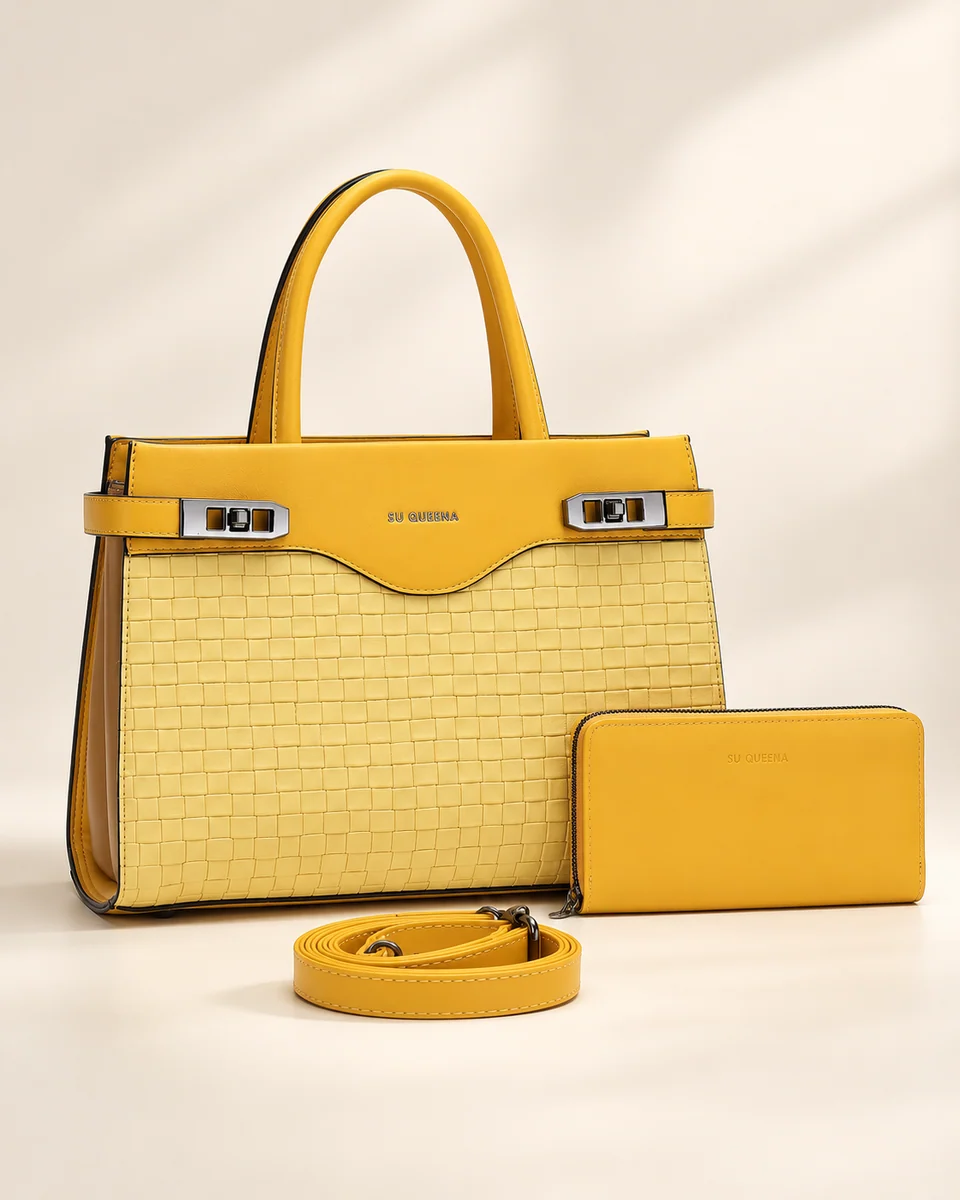 Model 2702, front three-quarter view with tall twin handles, shown with a wallet and shoulder strap.