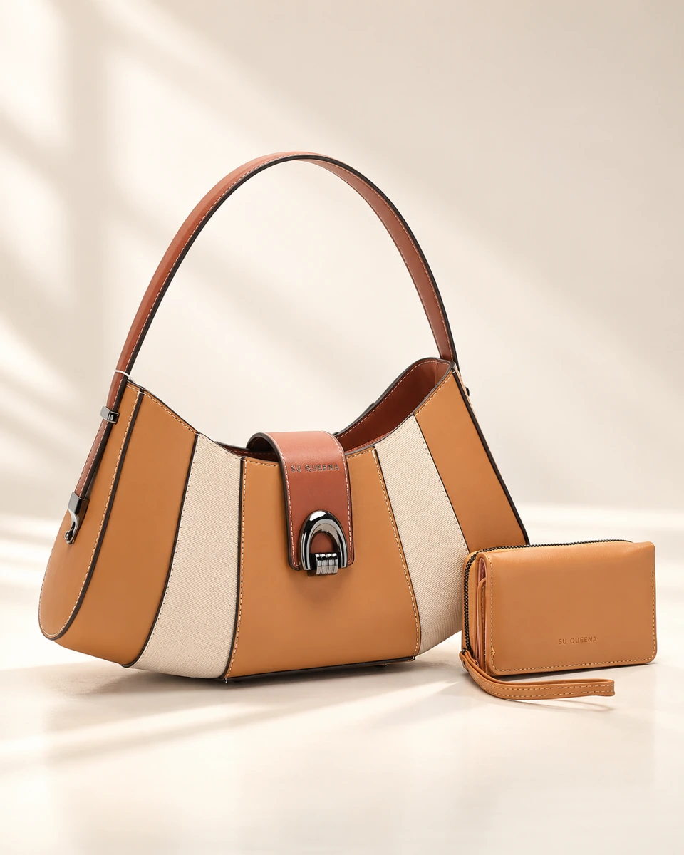Model 2750-1, curved shoulder bag shown in a front three-quarter view with a wallet.
