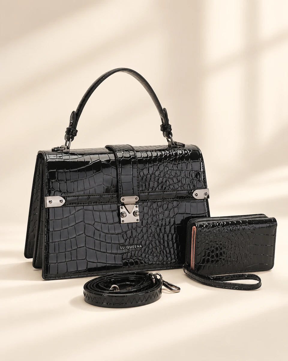 Model 2996, front three-quarter view with an arched handle, shown with a wallet and coiled shoulder strap.